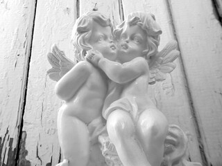 plaster figurine of two white angels