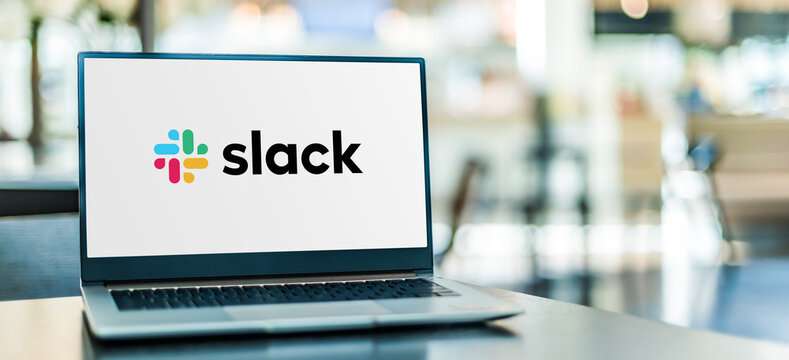 Laptop computer displaying logo of Slack