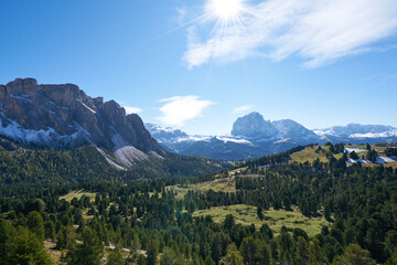 Beautiful langkofel mountain in the dolomites seen from the seceda alm with the first snow white...