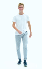 Fototapeta premium in full growth. smiling guy confidently goes to his goal.