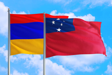 Samoa and Armenia national flag waving in the windy deep blue sky. Diplomacy and international relations concept.