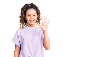 Beautiful kid girl with curly hair wearing casual clothes showing and pointing up with fingers number five while smiling confident and happy.