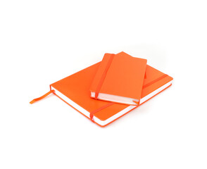 Two orange notebooks isolated  on a white background