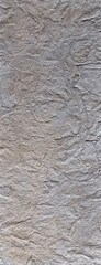 
The decorative plaster background looks like concrete, with blurring and darkening along the edges.
