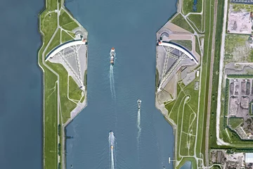 Poster Delta works, Maeslantkering, bird’s eye view – Maeslant Barrier, looking down aerial view from above - Rotterdam, Netherlands © gokturk_06