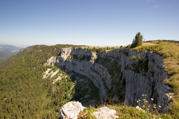 Creux du Van mountain under blue sky