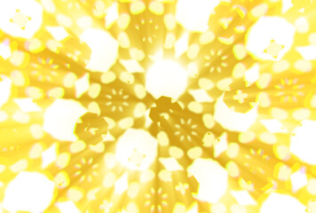 Blurred abstract background with bright holiday patterns. Blank background in yellow colors with empty space for text and festive patterns and light rays.