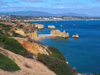 Fototapeta premium The beauty of Portugal - hiking in Lagos at the blue Atlantic ocean in Portugal