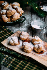 Profiteroles with custard on the table