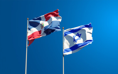 Beautiful national state flags of Israel and Dominican Republic together at the sky background. 3D artwork concept.