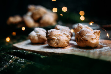 Profiteroles with custard on the table