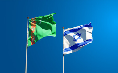 Beautiful national state flags of Turkmenistan and Israel together at the sky background. 3D artwork concept.