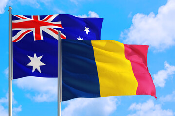 Chad and Australia national flag waving in the windy deep blue sky. Diplomacy and international relations concept.