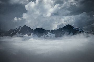 above the clouds, epic view from the slope of mount Elbrus