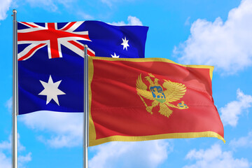 Montenegro and Australia national flag waving in the windy deep blue sky. Diplomacy and international relations concept.