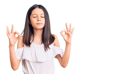 Beautiful child girl wearing casual clothes relax and smiling with eyes closed doing meditation gesture with fingers. yoga concept.