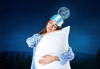 Beautiful woman and night starry sky with full moon on background. Bedtime