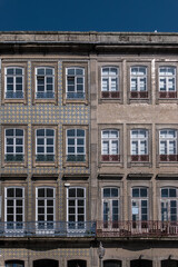 Fototapeta na wymiar Fragments of traditional Portuguese architecture of old buildings in Porto old town, Portugal.