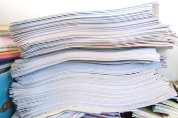 Papersheet of Overload stack messy documents of report papers for reseacrch teacher classroom...