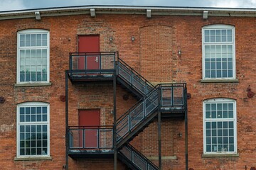 Staircase on street building wall