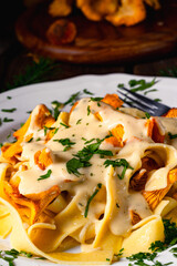 Tagliatelle with fresh chanterelles in a mushroom sauce