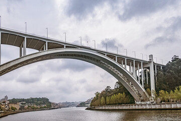 Arrabida Bridge - arch bridge of reinforced concrete over the Douro River, between Porto and Vila Nova de Gaia. Porto, Portugal.