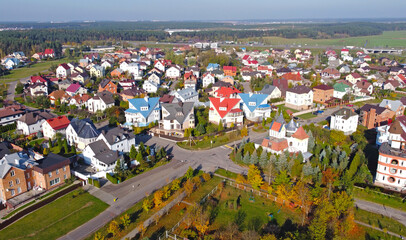 Top view of a beautiful suburb with expensive cottages