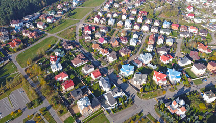 Top view of a beautiful suburb with expensive cottages