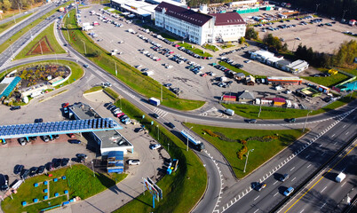 Fototapeta na wymiar Top view of the highway highway in the city with cars