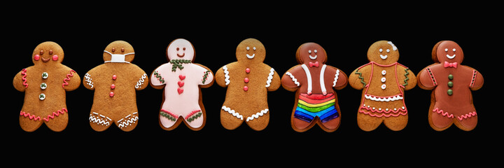Social diversity. Conceptual background. Individuality tolerance. Pandemic party. Different gender multiethnic gay gingerbread men without face mask together colorful composition isolated on black.