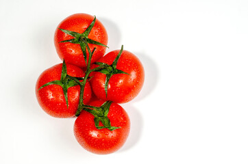 Cherry tomatoes, several pieces with moisture drops, close-up