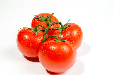 Cherry tomatoes, several pieces with moisture drops, close-up