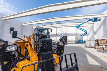 Warehouse construction with industrial vehicles.