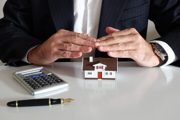 agent immobilier protège la maison