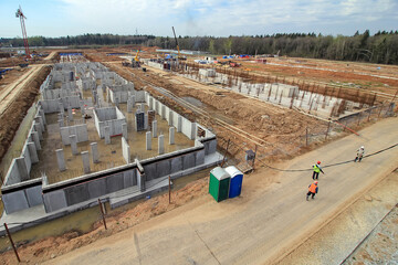 foundation pit for construction of residential building is flooded under water. Flooding...