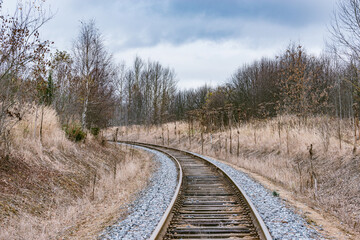 Fototapeta premium Single railway line at autumn day time.