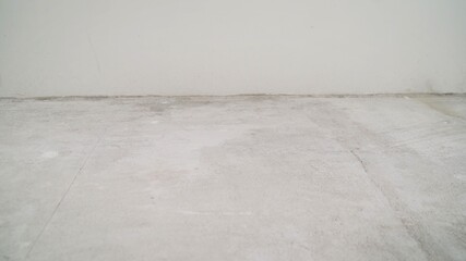 Floors before treatment. Concrete floors in a new apartment. over view,repair cracked floor before waterproof cement treatment system.