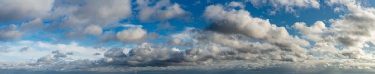 Fantastic soft clouds against blue sky, natural composition