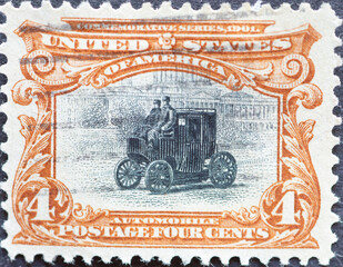 USA - Circa 1901 : a postage stamp printed in the US showing a historic electric automobile...