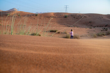 Picture of a child in the desert.