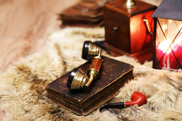 Retro old book and world desk globe on fur, learning and education concepts.