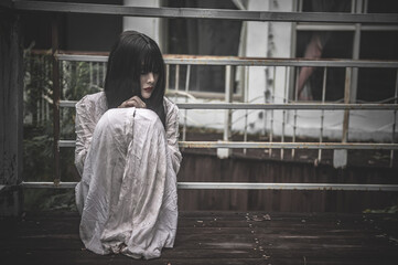 Portrait of asian woman make up ghost,Scary horror scene for background,Halloween festival...