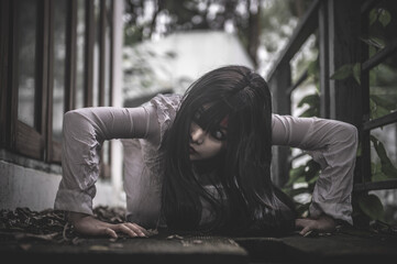Portrait of asian woman make up ghost,Scary horror scene for background,Halloween festival...