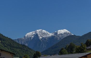 Berchtesgaden view at snow capped mountains in the distance