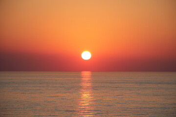 Obraz premium Tramonto sul mare. Alba