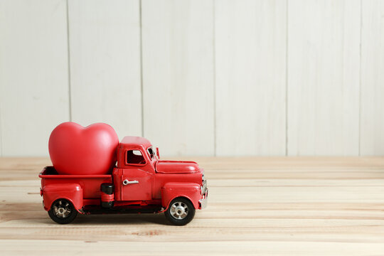 Red Truck and heart, ready to delivery love on Valentine's day.