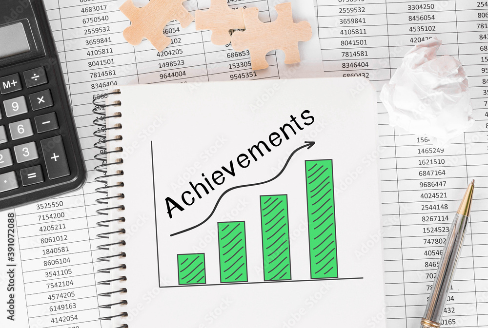 Poster notebook with toolls and notes about achievement
