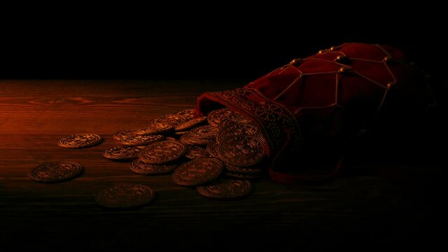 Bag Of Gold Coins In Fire Glow