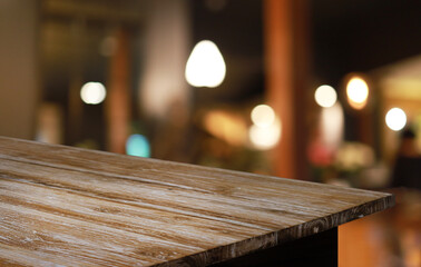 Wood Table Top in Blur Background room interior with empty copy space.