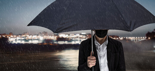 Mann mit Regenschirm